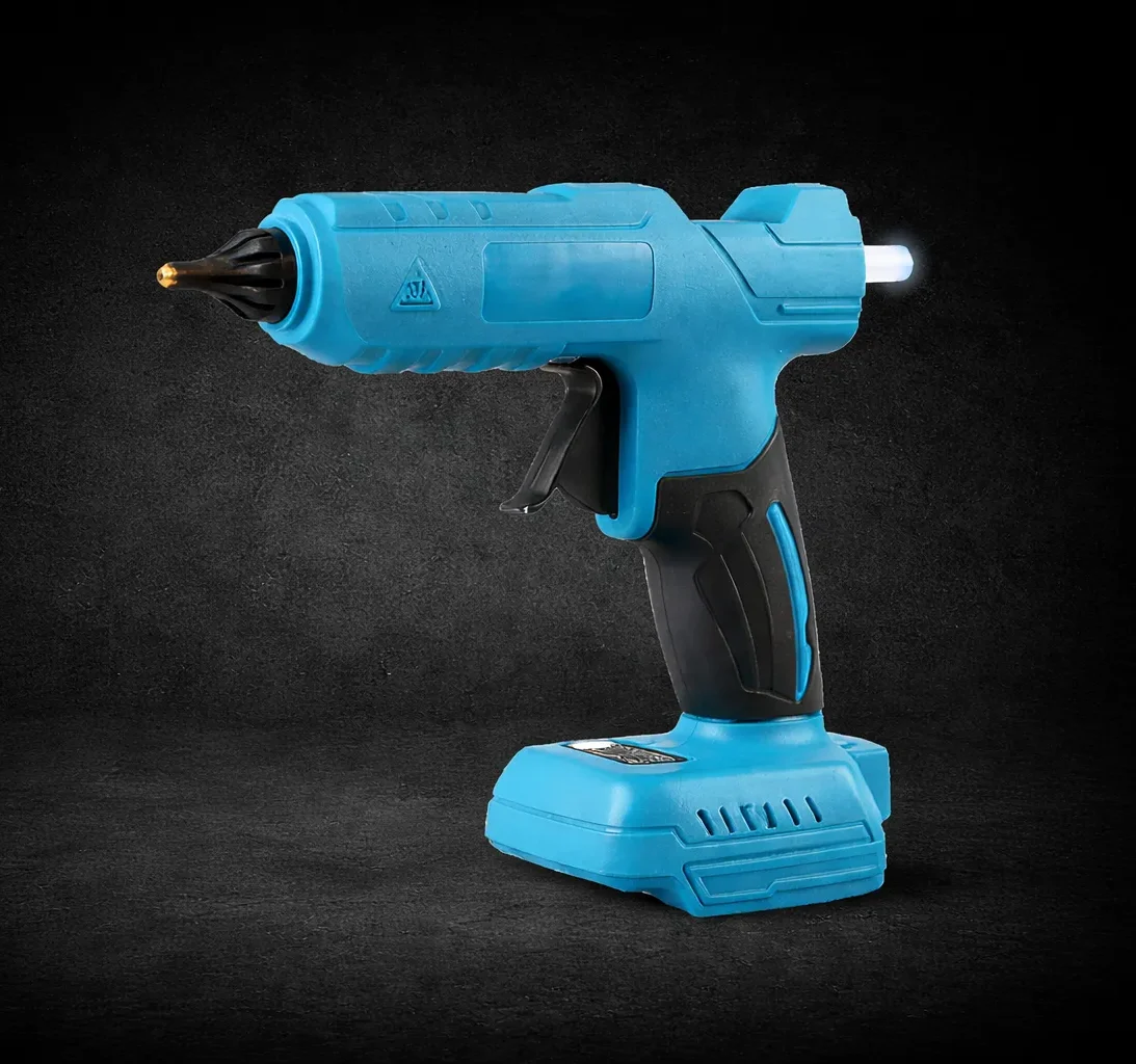 Mėlynas ir juodas plastikinis rankinis įrankis su gaiduku, antgaliu ir tekstūruota rankena